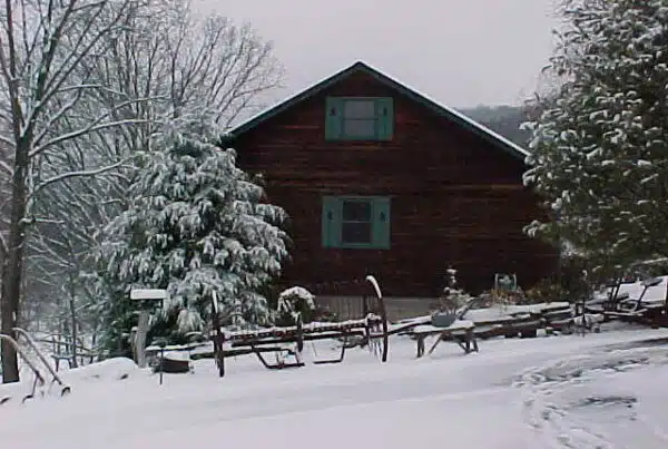 Log cabin in winter snow