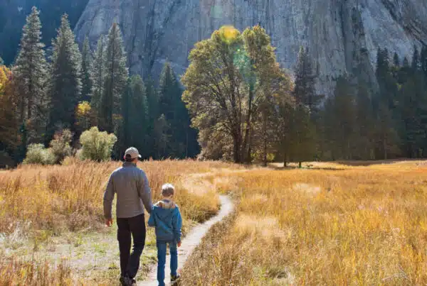 Father son walking on trail
